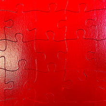 Load image into Gallery viewer, puzzle piece detail: 2-sided monochrome fire engine red puzzle
